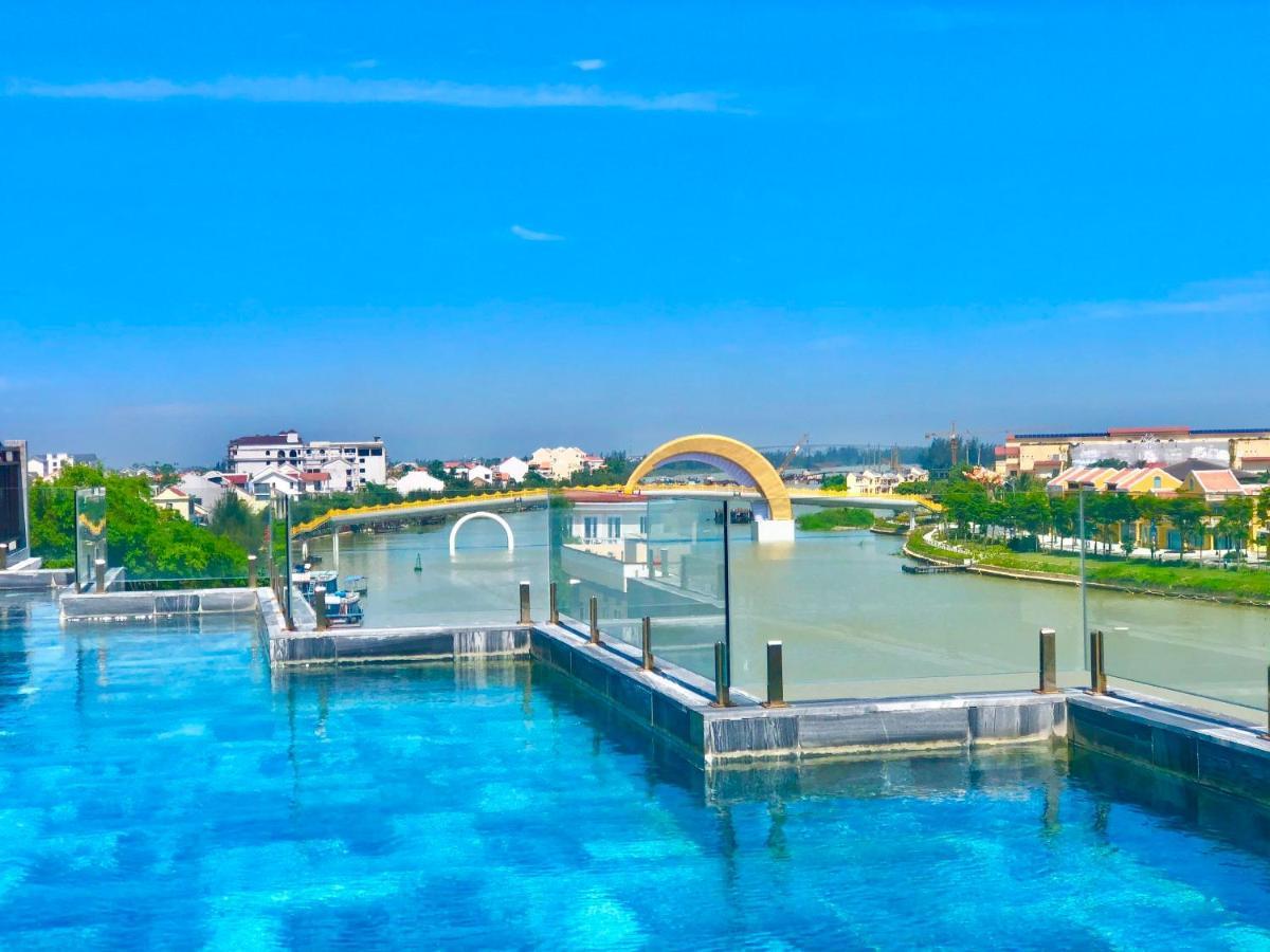 Little Riverside Hoi An . A Luxury Hotel & Spa Esterno foto View of the bridge from the rooftop pool of the hotel